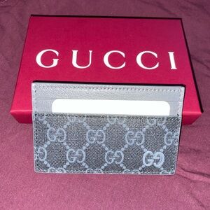 AUTHENTIC Gucci card holder wallet for men in black.
